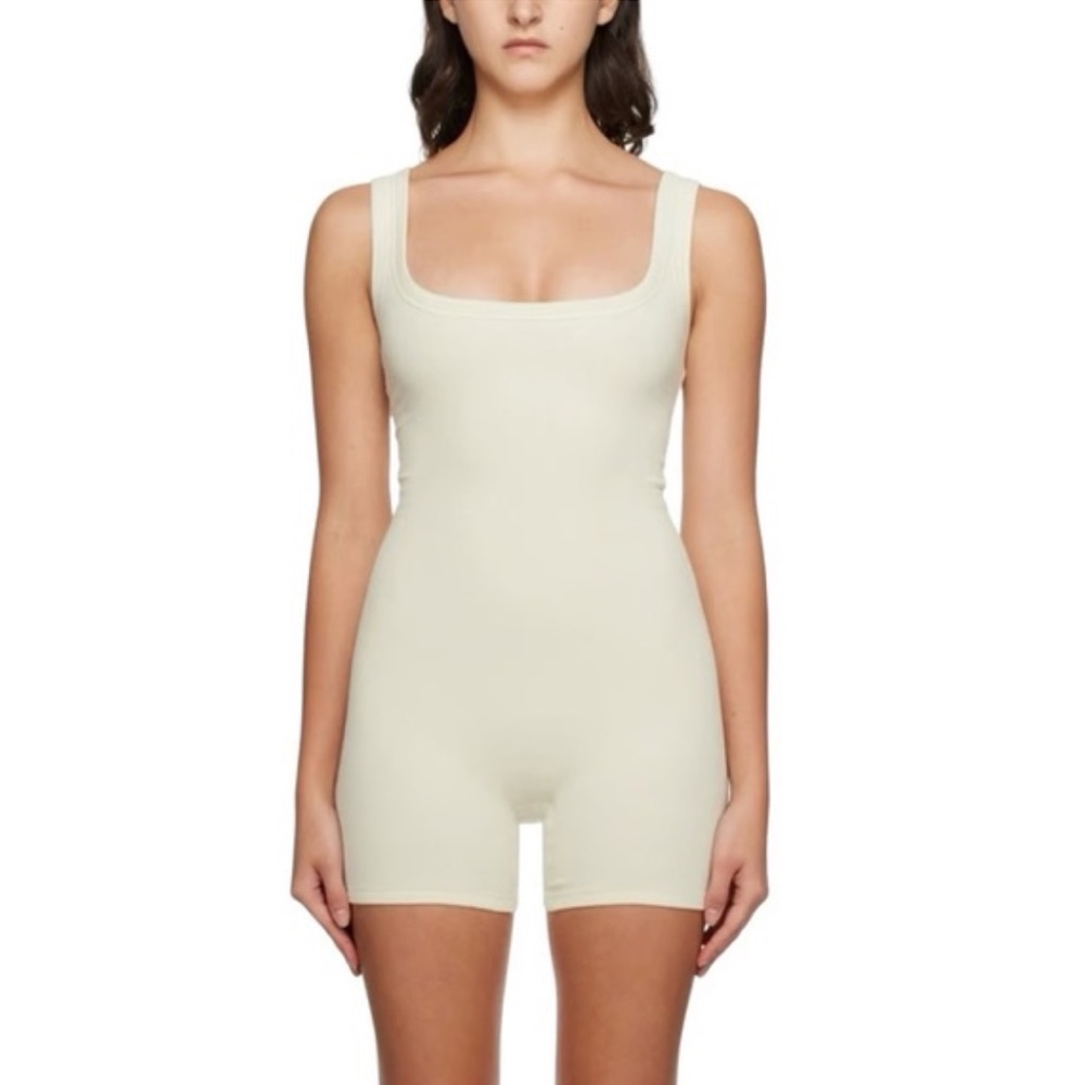 Skims Ribbed Onesie in “Bone”
